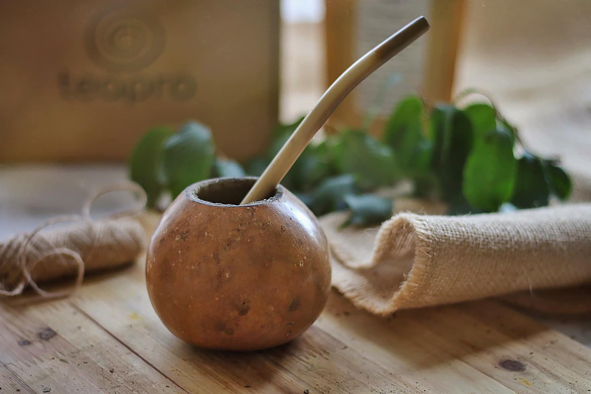 Chimarrão, traditional yerba mate tea, on the table. Yerba mate tea, a  typical drink from southern Brazil, Argentina, Uruguay and Paraguay. An  infusion of Yerba Mate (IIex paraguariensis). Stock Photo